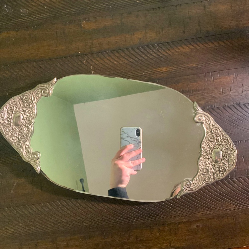Godinger Silver Co., silver oval mirror tray.